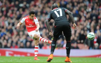 LONDON, ENGLAND - APRIL 4: Alexis Sanchez scores the 3rd Arsenal goal during the Barclays Premier League match between Arsenal and Liverpool at Emirates Stadium on April 4, 2015 in London, England. Photo by Stuart MacFarlane/Arsenal FC via Getty Images) *** Local Caption *** Alexis Sanchez