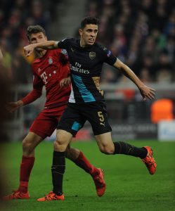 MUNICH, GERMANY - NOVEMBER 04: Gabriel of Arsenal holds off Thomas Muller of Bayern Munich during the UEFA Champions League Group Stage match between Bayern Muenchen and Arsenal at the Allianz Arena on November 4, 2015 in Munich, Germany. (Photo by Stuart MacFarlane/Arsenal FC via Getty Images *** Local Caption *** Gabriel;Thomas Muller