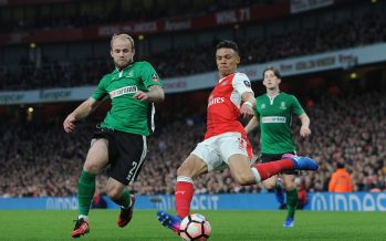 LONDON, ENGLAND - MARCH 11: Kieran Gibbs of Arsenal takes on Bradley Wood of Lincoln during the match between Arsenal and Lincoln City at Emirates Stadium on March 11, 2017 in London, England. (Photo by David Price/Arsenal FC via Getty Images) *** Local Caption *** Kieran Gibbs; Bardley Wood