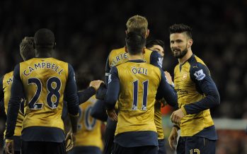 LIVERPOOL, ENGLAND - JANUARY 13: Olivier Giroud celebrates scoring Arsenal's 2nd goal with his team mates during the Barclays Premier League match between Liverpool and Arsenal at Anfield Stadium on January 13th, 2016 in Liverpool in England (Photo by David Price/Arsenal FC via Getty Images) *** Local Caption *** Olivier Giroud