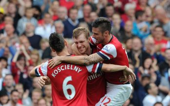 LONDON, ENGLAND - SEPTEMBER 22: Per Mertesacker celebrates scoring Arsenal's 2nd goal with Olivier Giroud and Laurent Koscielny during the Barclays Premier League match between Arsenal and Stoke City at Emirates Stadium on September 22, 2013 in London, England. Photo by David Price/Arsenal FC via Getty Images) (Photo by David Price/Arsenal FC via Getty Images) *** Local Caption *** Per Mertesacker; Olivier Giroud; Laurent Koscielny
