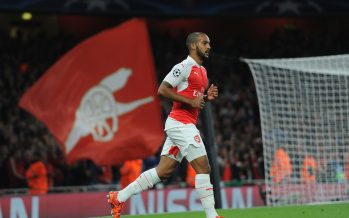 LONDON, ENGLAND - SEPTEMBER 29: Theo Walcott jogs back after scoring a goal for Arsenal during the match between Arsenal and Olympiacos on September 29, 2015 in London, United Kingdom. (Photo by David Price/Arsenal FC via Getty Images) *** Local Caption *** Theo Walcott