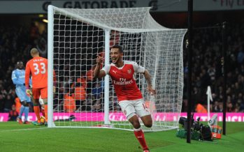 LONDON, ENGLAND - DECEMBER 10: Theo Walcott celebrates scoring for Arsenal during the Premier League match between Arsenal and Stoke City at Emirates Stadium on December 10, 2016 in London, England. (Photo by Stuart MacFarlane/Arsenal FC via Getty Images) *** Local Caption *** Theo Walcott