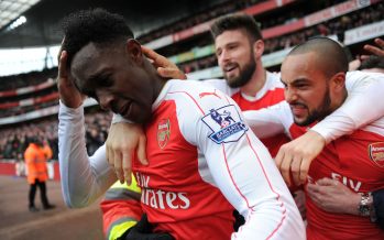 LONDON, ENGLAND - FEBRUARY 14: Danny Welbeck celebrates scoring Arsenal's 2nd goal with Theo Walcott and Olivier Giroud and the fans during the Barclays Premier League match between Arsenal and Leicester City at Emirates Stadium on February 14th, 2016 in London, England (Photo by David Price/Arsenal FC via Getty Images) *** Local Caption *** Danny Welbeck; Theo Walcott; Olivier Welbeck