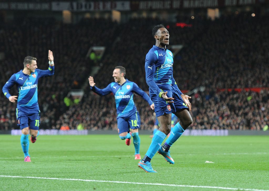 MANCHESTER, ENGLAND - MARCH 09: Danny Welbeck celebrates scoring the 2nd Arsenal during the FA Cup Quarter Final between Manchester United and Arsenal at Old Trafford on March 9, 2015 in Manchester, England. (Photo by Stuart MacFarlane/Arsenal FC via Getty Images) *** Local Caption *** Danny Welbeck