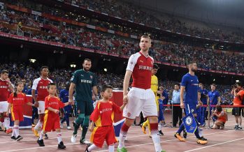 BEIJING, CHINA - JULY 22: Per Mertesacker of Arsenal leads the team out before the match between Arsenal and Chelsea at Birds Nest on July 22, 2017 in Beijing, China. (Photo by David Price/Arsenal FC via Getty Images) *** Local Caption *** Per Mertesacker