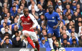 LONDON, ENGLAND - SEPTEMBER 17: Alexandre Lacazette of Arsenal passes the ball under pressure from N'Golo Kante of Chelsea during the Premier League match between Chelsea and Arsenal at Stamford Bridge on September 17, 2017 in London, England. (Photo by David Price/Arsenal FC via Getty Images) *** Local Caption *** Alexandre Lacazette; N'Golo Kante
