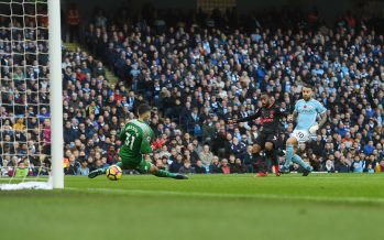 MANCHESTER, ENGLAND - NOVEMBER 05: Alex Lacazette shoots past Man City goalkeeper Ederson to score the Arsenal goal during the Premier League match between Manchester City and Arsenal at Etihad Stadium on November 5, 2017 in Manchester, England. (Photo by Stuart MacFarlane/Arsenal FC via Getty Images) *** Local Caption *** Alex Lacazette;Ederson
