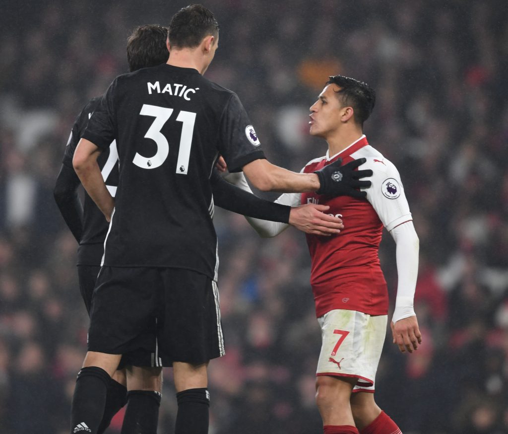 LONDON, ENGLAND - DECEMBER 02: Arsenal's Alexis Sanchez clashes with Nemanja Matic of Man United during the Premier League match between Arsenal and Manchester United at Emirates Stadium on December 2, 2017 in London, England. (Photo by Stuart MacFarlane/Arsenal FC via Getty Images) *** Local Caption *** Alexis Sanchez;Nemanja Matic