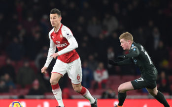 LONDON, ENGLAND - MARCH 01: Laurent Koscielny of Arsenal breaks past Kevin De Bruyne of Man City during the Premier League match between Arsenal and Manchester City at Emirates Stadium on March 1, 2018 in London, England. (Photo by Stuart MacFarlane/Arsenal FC via Getty Images) *** Local Caption *** Laurent Koscielny;Kevin De Bruyne