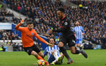 BRIGHTON, ENGLAND - MARCH 04: Pierre-Emerick Aubameyang of Arsenal skips past Matthew Ryan and Ezequiel Schelotto of Brighton during the Premier League match between Brighton and Hove Albion and Arsenal at Amex Stadium on March 4, 2018 in Brighton, England. (Photo by David Price/Arsenal FC via Getty Images) *** Local Caption *** Pierre-Emerick Aubameyang; Ezequiel Schelotto; Matthew Ryan