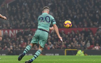 MANCHESTER, ENGLAND - DECEMBER 05: Shkodran Mustafi scores Arsenal's goal during the Premier League match between Manchester United and Arsenal FC at Old Trafford on December 5, 2018 in Manchester, United Kingdom. (Photo by David Price/Arsenal FC via Getty Images) *** Local Caption *** Shkodran Mustafi