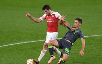 LONDON, ENGLAND - NOVEMBER 08: Sokratis of Arsenal is challenged by Miguel Luis of Sporting moves in during the UEFA Europa League Group E match between Arsenal and Sporting CP at Emirates Stadium on November 8, 2018 in London, United Kingdom. (Photo by David Price/Arsenal FC via Getty Images) *** Local Caption *** Miguel Luis;Sokratis