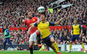 MANCHESTER, ENGLAND - MAY 17: Alexis Sanchez of Arsenal is challenged by Juan Mata of Manchester United during the match between Manchester United and Arsenal in the Barclays Premier League at Old Trafford on May 17, 2015 in Manchester, England. (Photo by David Price/Arsenal FC via Getty Images) *** Local Caption *** Alexis Sanchez; Juan Mata
