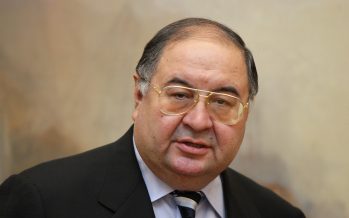 LONDON - NOVEMBER 07: Russian Oligarch Alisher Usmanov is pictured in front of JMW Turner's painting ' The Harbour of Brest ' in the Tate Britain art gallery on November 7, 2008 in London, England. The Pushkin Museum in Moscow is hosting a major exhibition of works by JMW Turner on loan from Tate Britain thanks to it's sole sponsor, Alisher Usmanov. Mr Usmanov who is a major shareholder in the Russian industrial conglomerate, Metalloinvest, as well as Arsenal Football Club, is reported to have a personal fortune of approximately £2.7bn. (Photo by Oli Scarff/Getty Images)